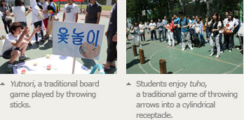 Yutnori, a traditional board game played by throwing sticks, Students enjoy tuho, a traditional game of throwing arrows into a cylindrical receptacle.