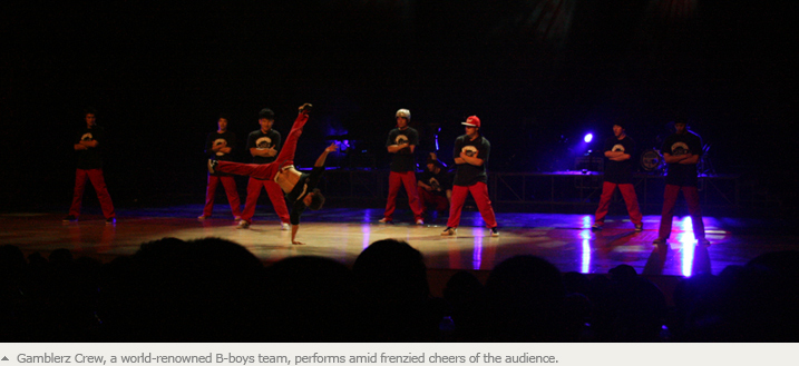 Gamblerz Crew, a world-renowned B-boys team, performs amid frenzied cheers of the audience.